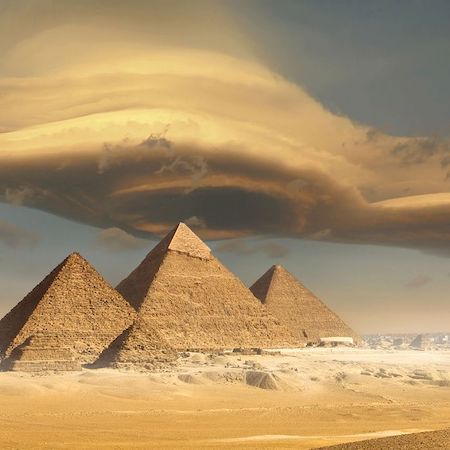 Picture showing the pyramids and desert